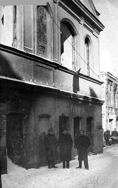 Standing outside the ransacked Gaon's Kloyz prior to its demolition in the 1950s.